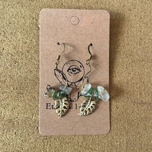 Gold monstera leaf dangle earrings with citrine and green stones
